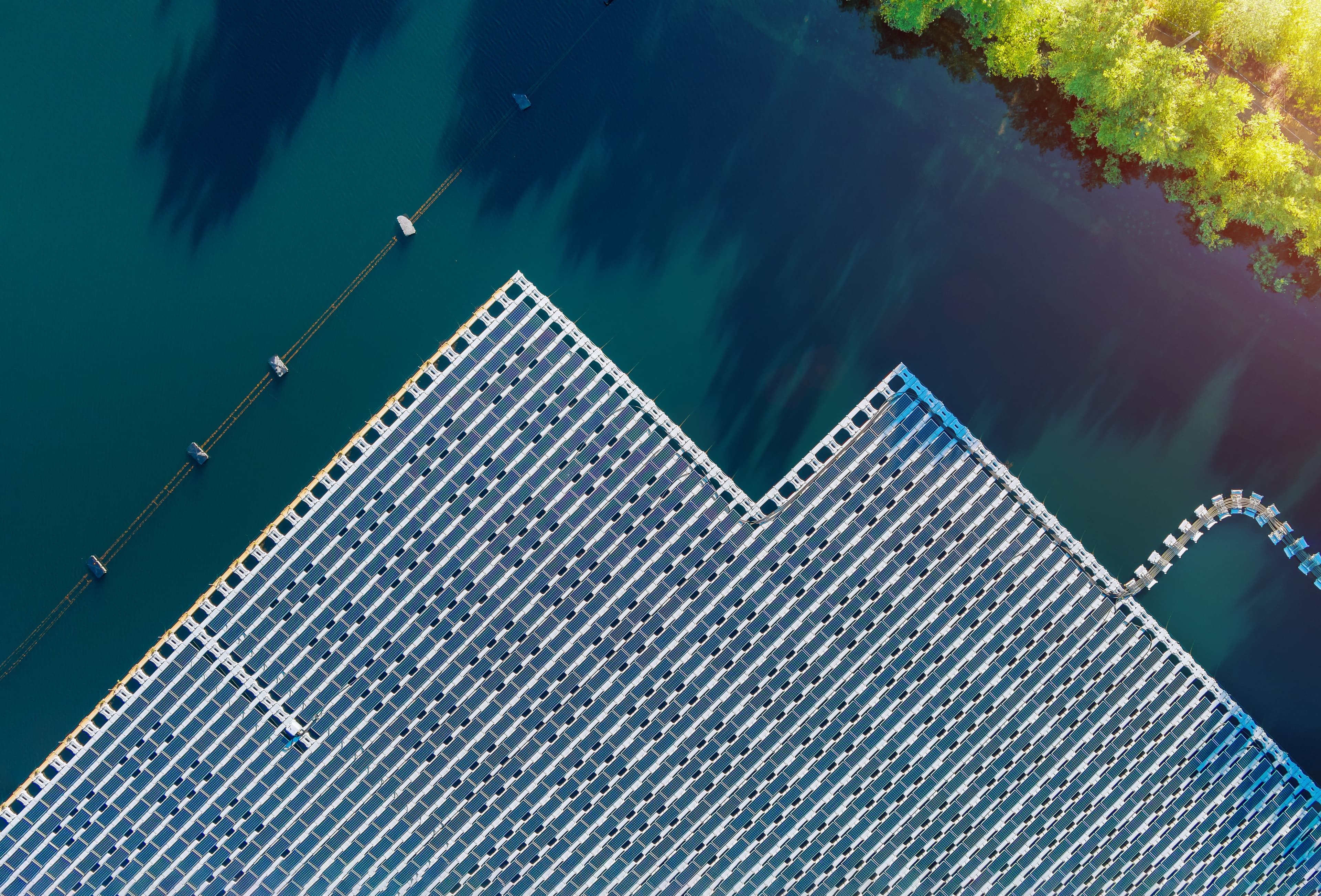 Floating solar panels installed on water reservoir demonstrating sustainable energy generation